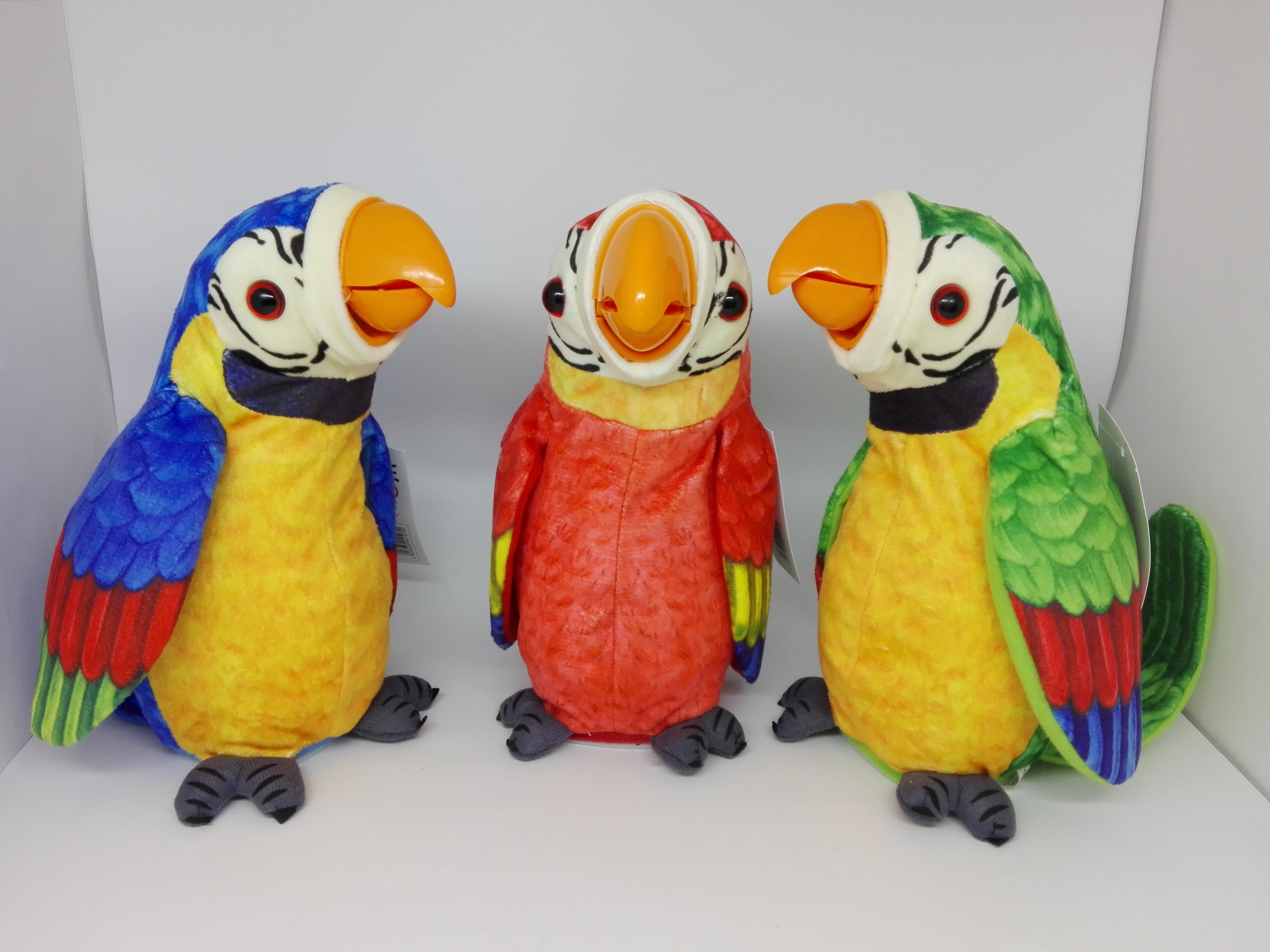 М'яка інтерактивна іграшка папуга 23см, повтор голосу, дзьоб ворушиться, 3 кольори (48шт/2)